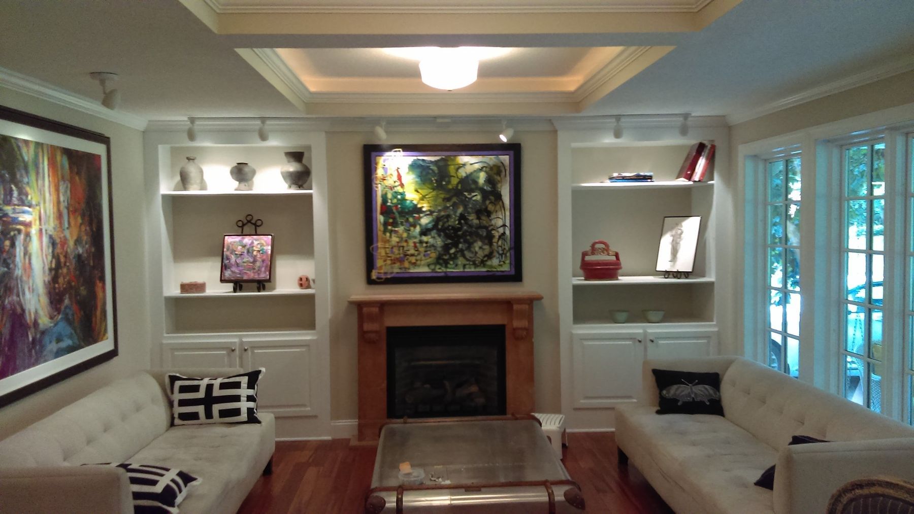 Living room with light greige walls and white built-ins
