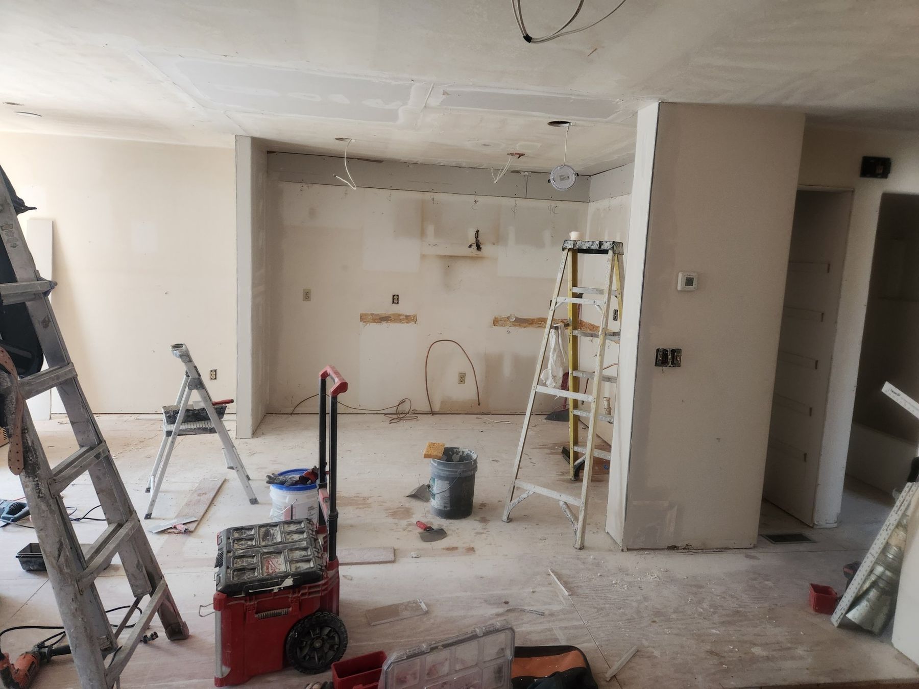 Ceiling scraped smooth and patched after popcorn texture removal