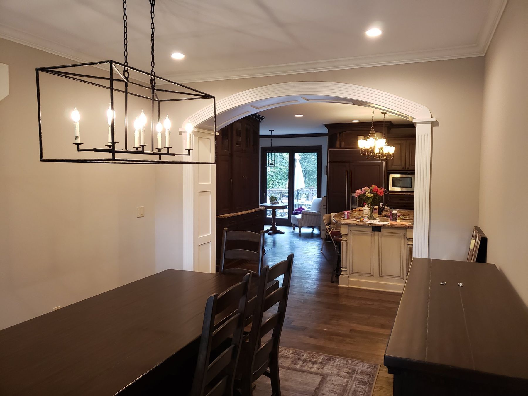 Dining room looking toward the kitchen, trim painted white