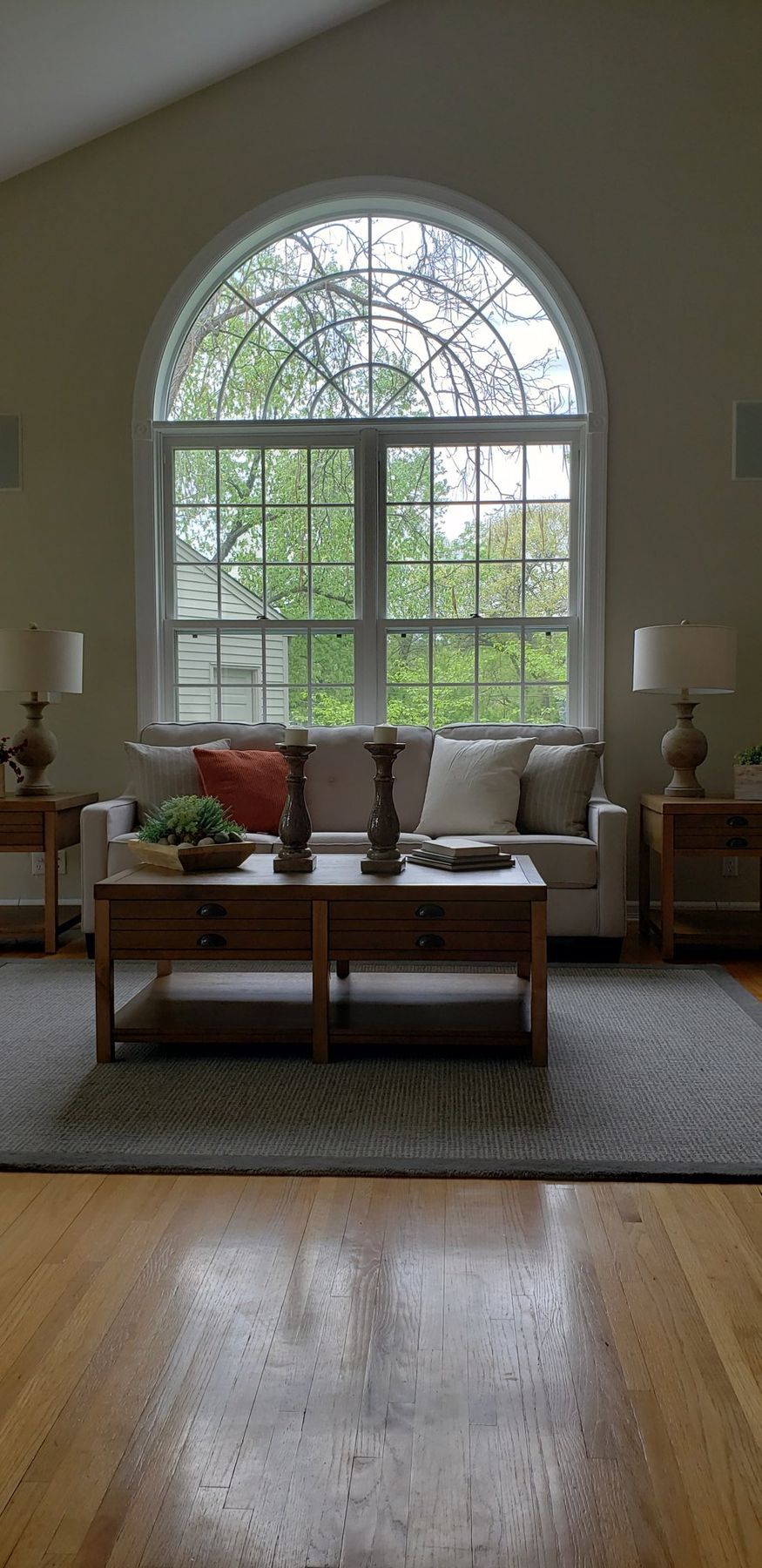 Arched-top window with white casing
