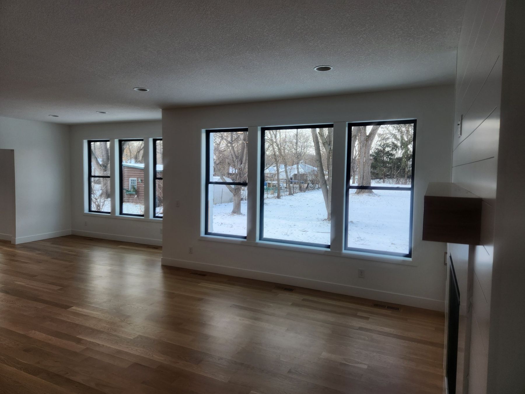 Great room with black-framed windows