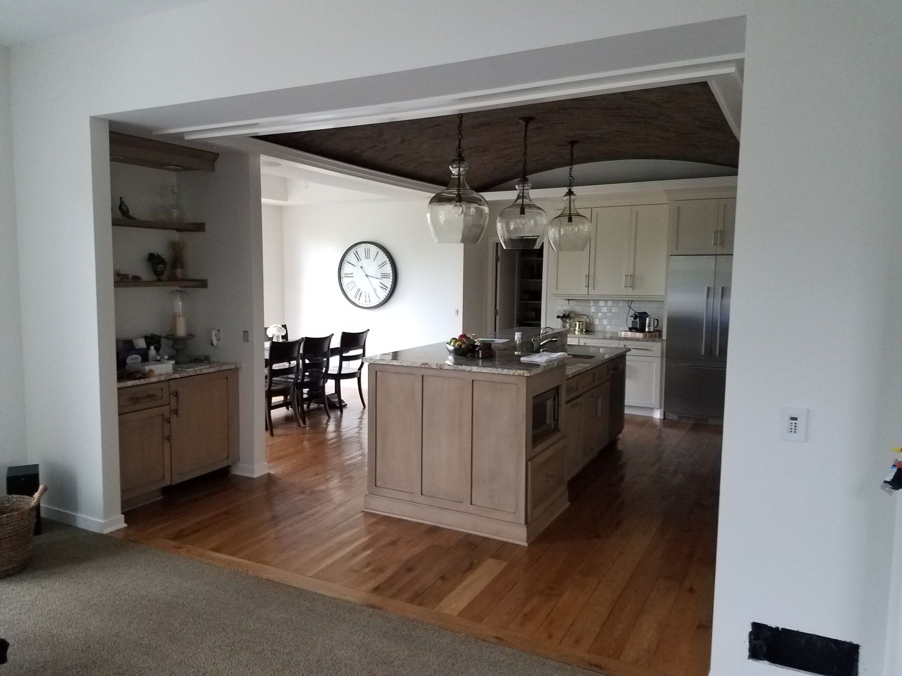 View into the kitchen through a painted opening