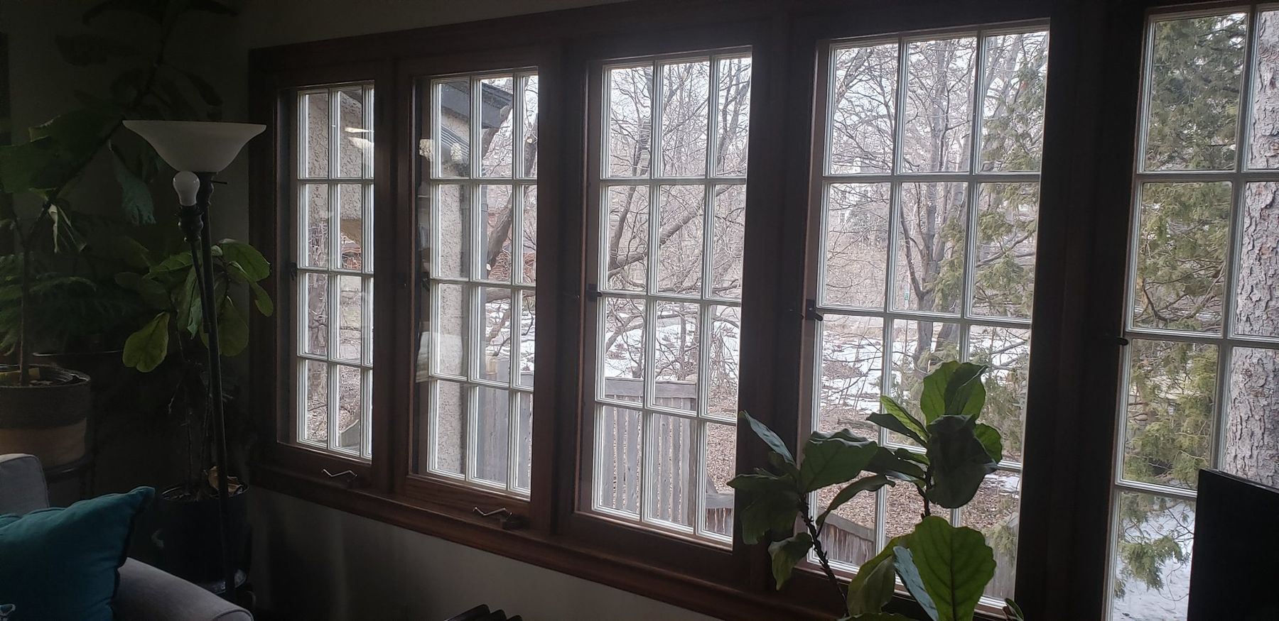 Before: weathered original sashes in the living room