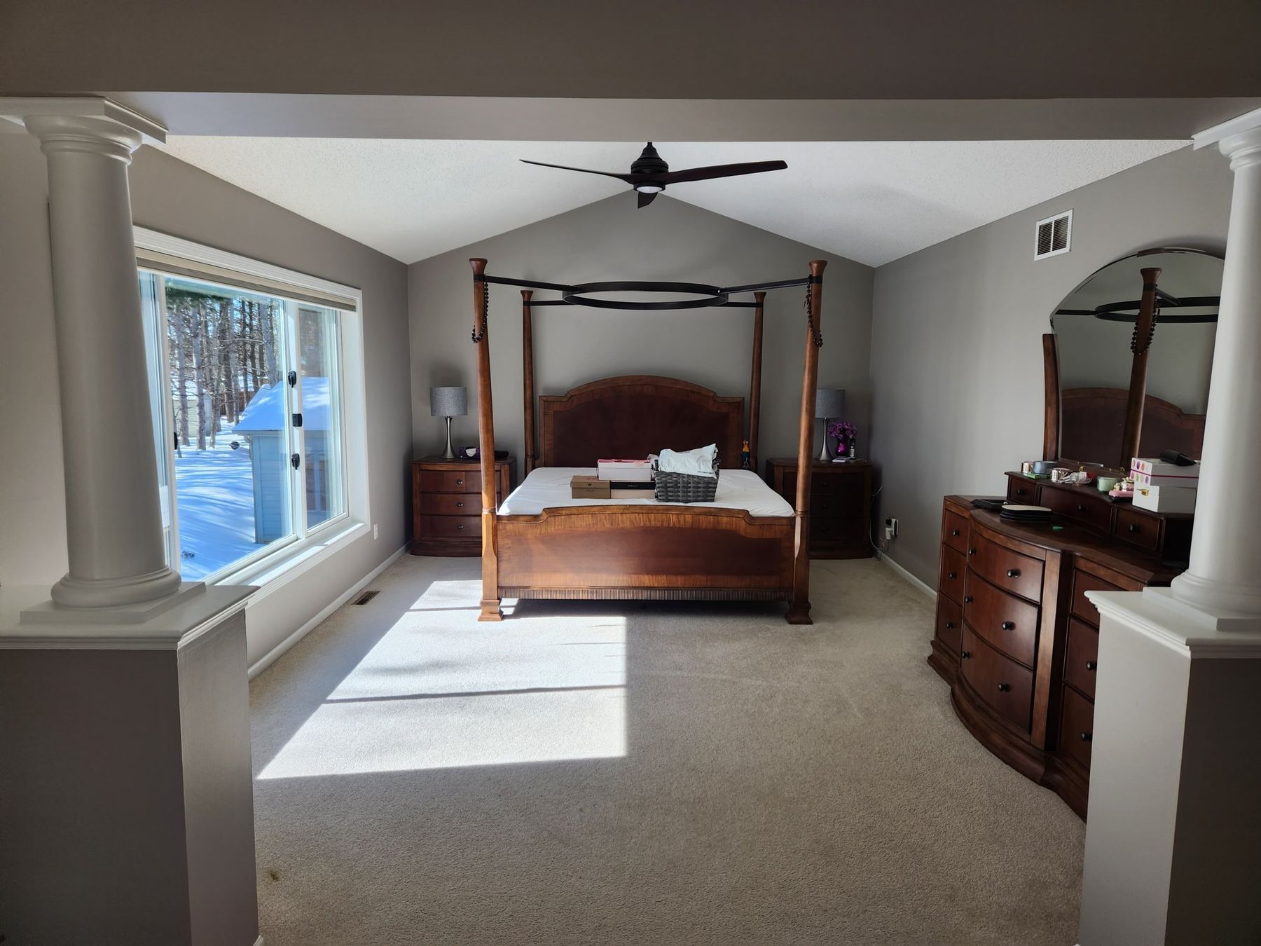 After: Bedroom: deep plum walls repainted light gray