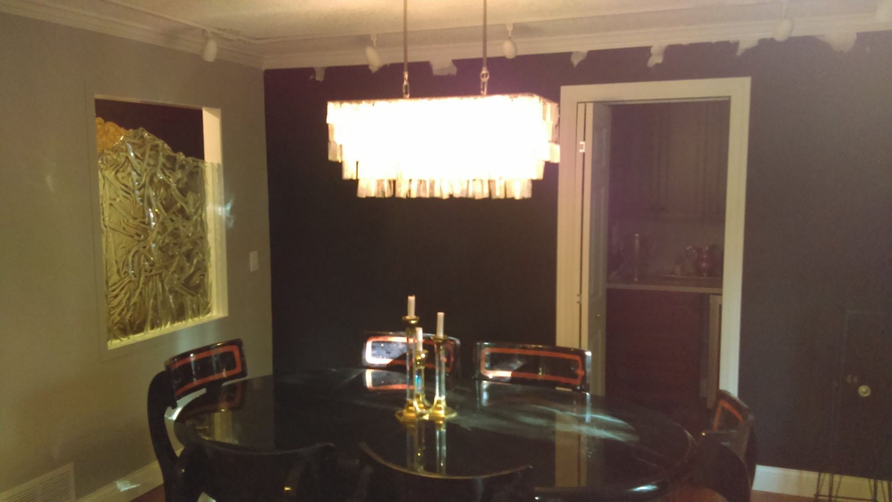 Before: Dining room: dark charcoal walls to light greige