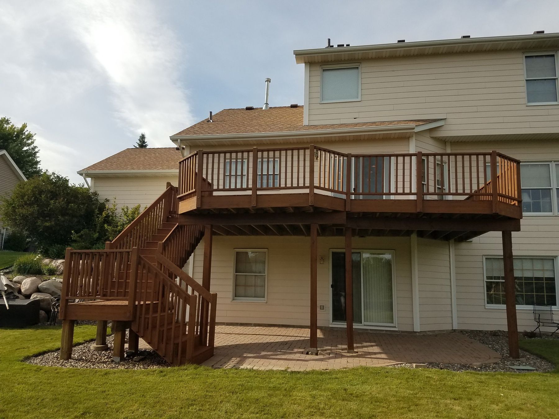 After: Deck railings and stairs after staining