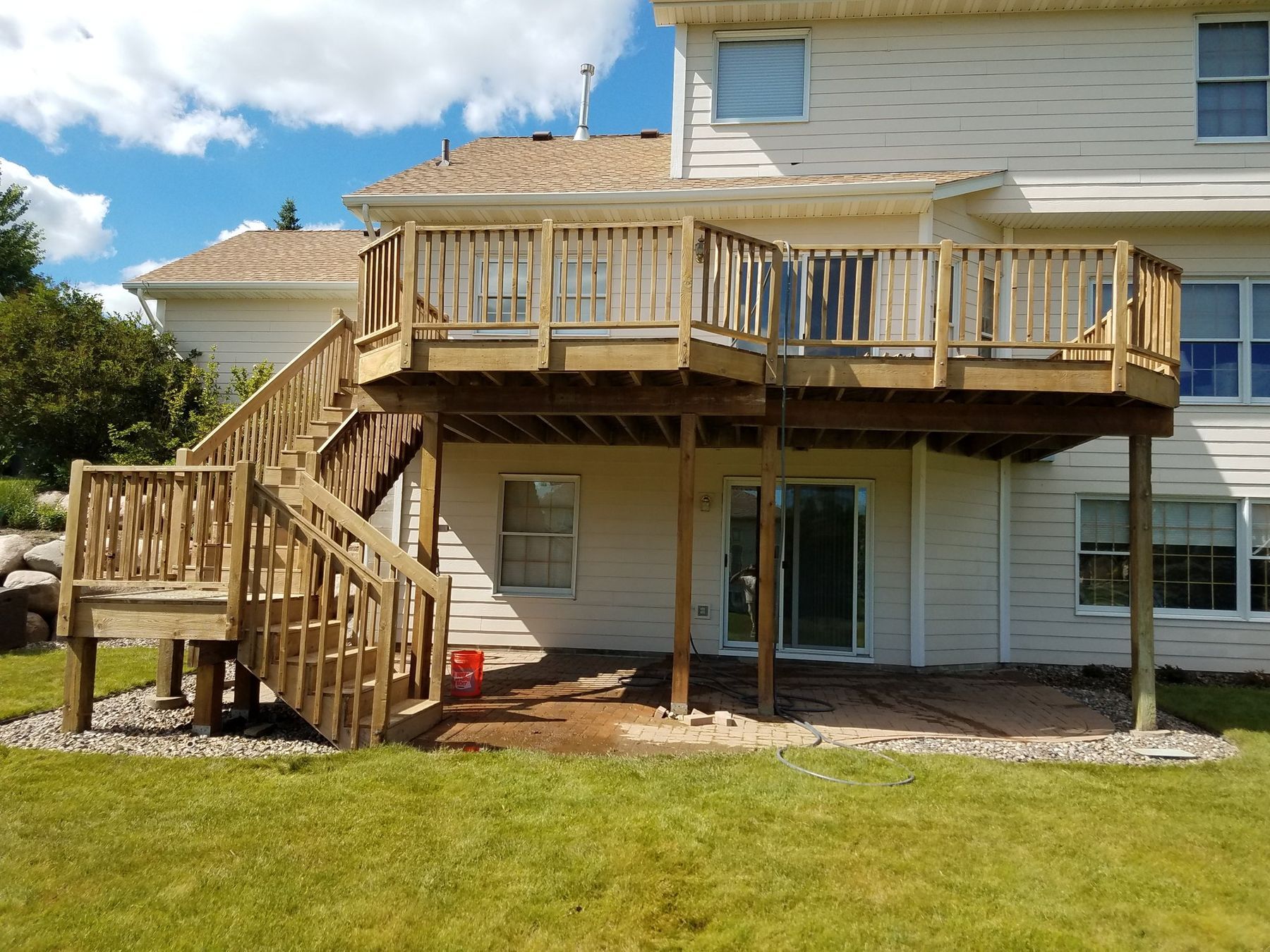 Before: Deck railings and stairs after staining