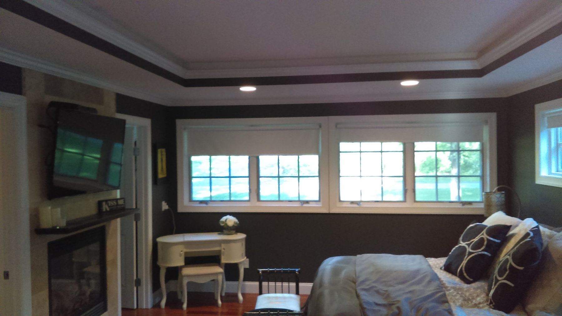 Before: Primary bedroom: near-black walls to light greige