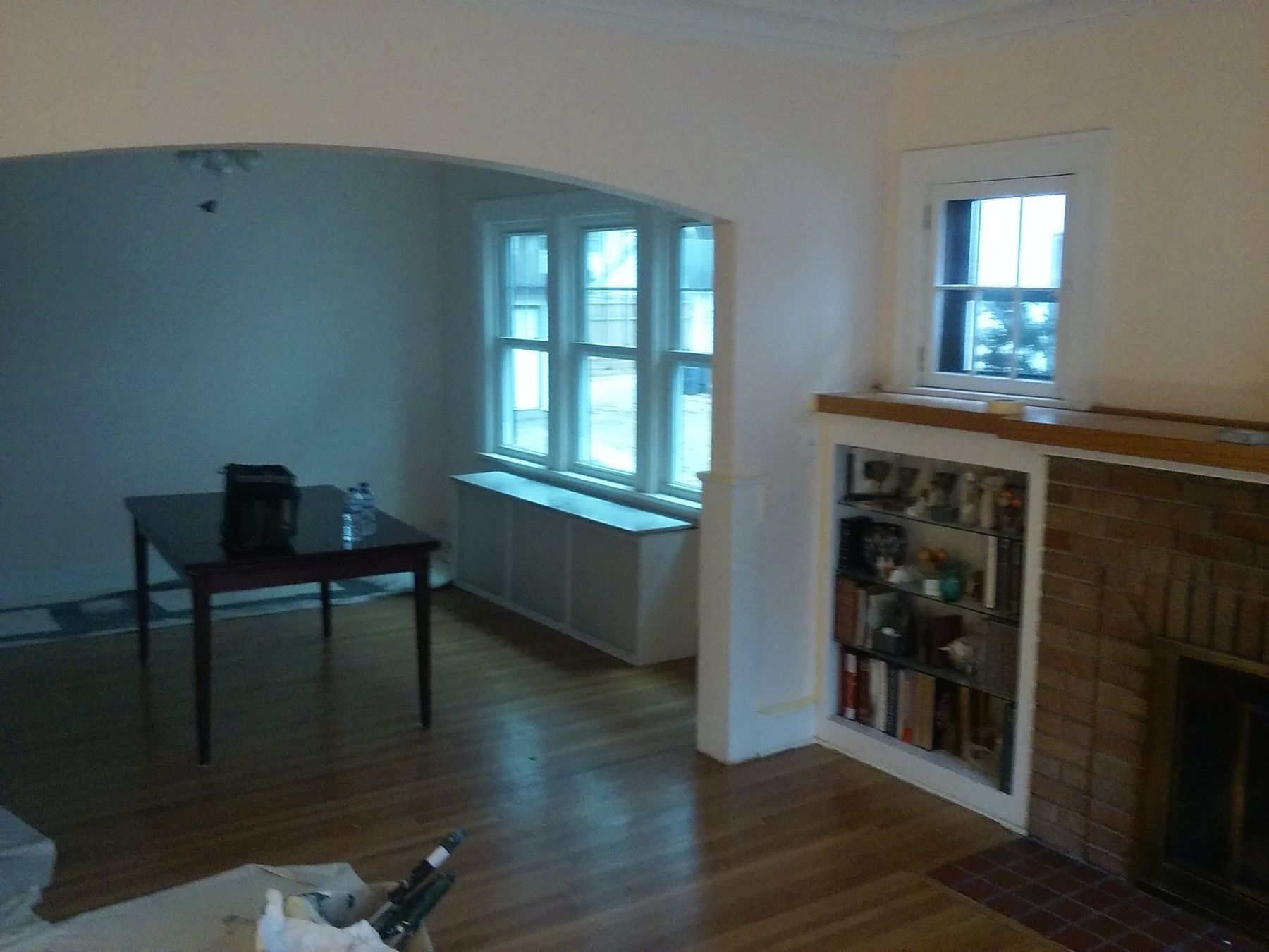 Before: Living room toward the arch