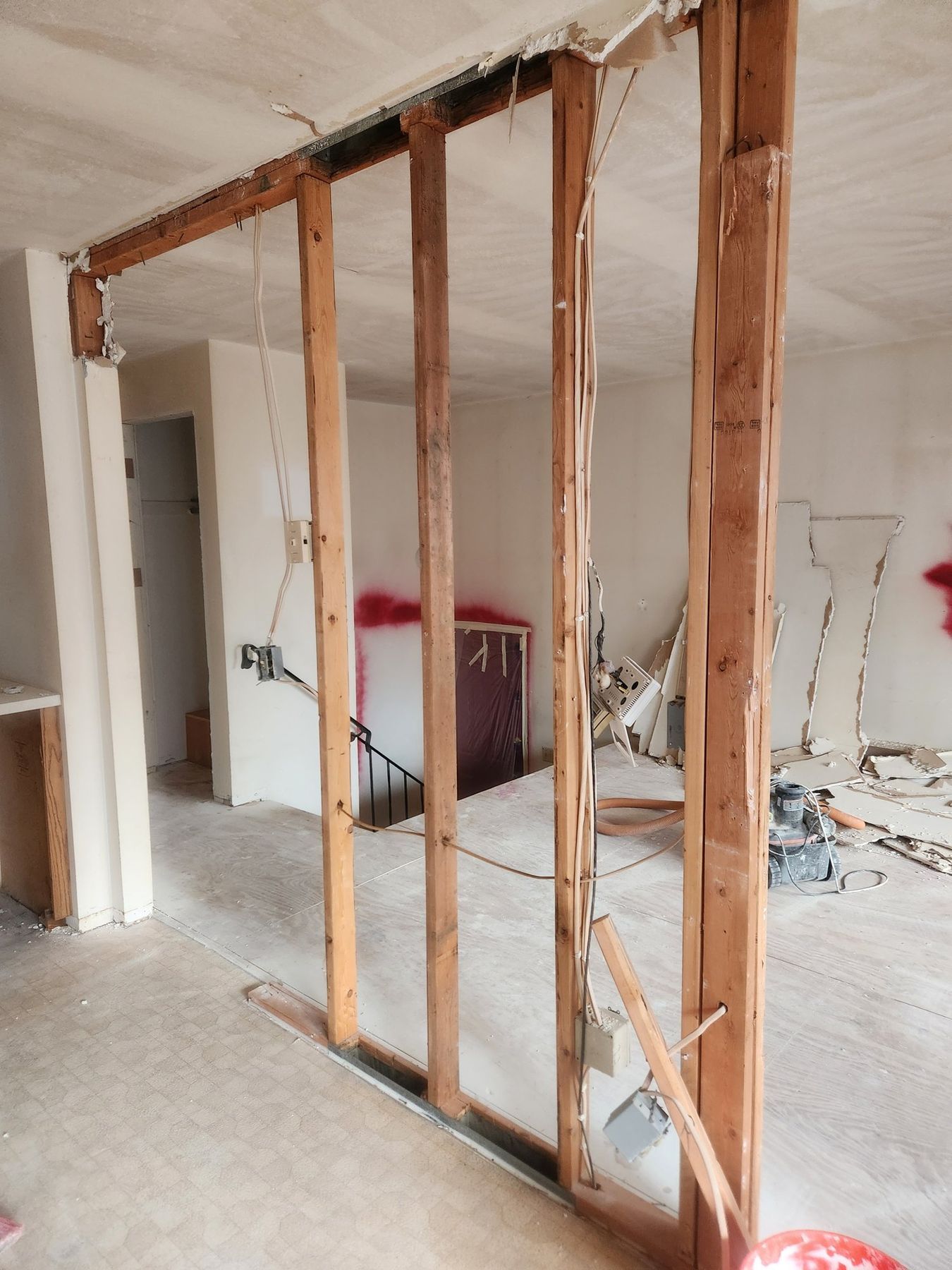 Soffit and wall framing exposed during demolition
