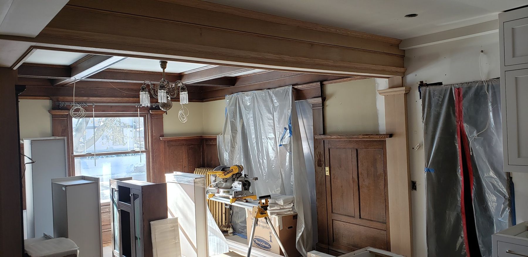 Zipwall barriers around the kitchen during the remodel