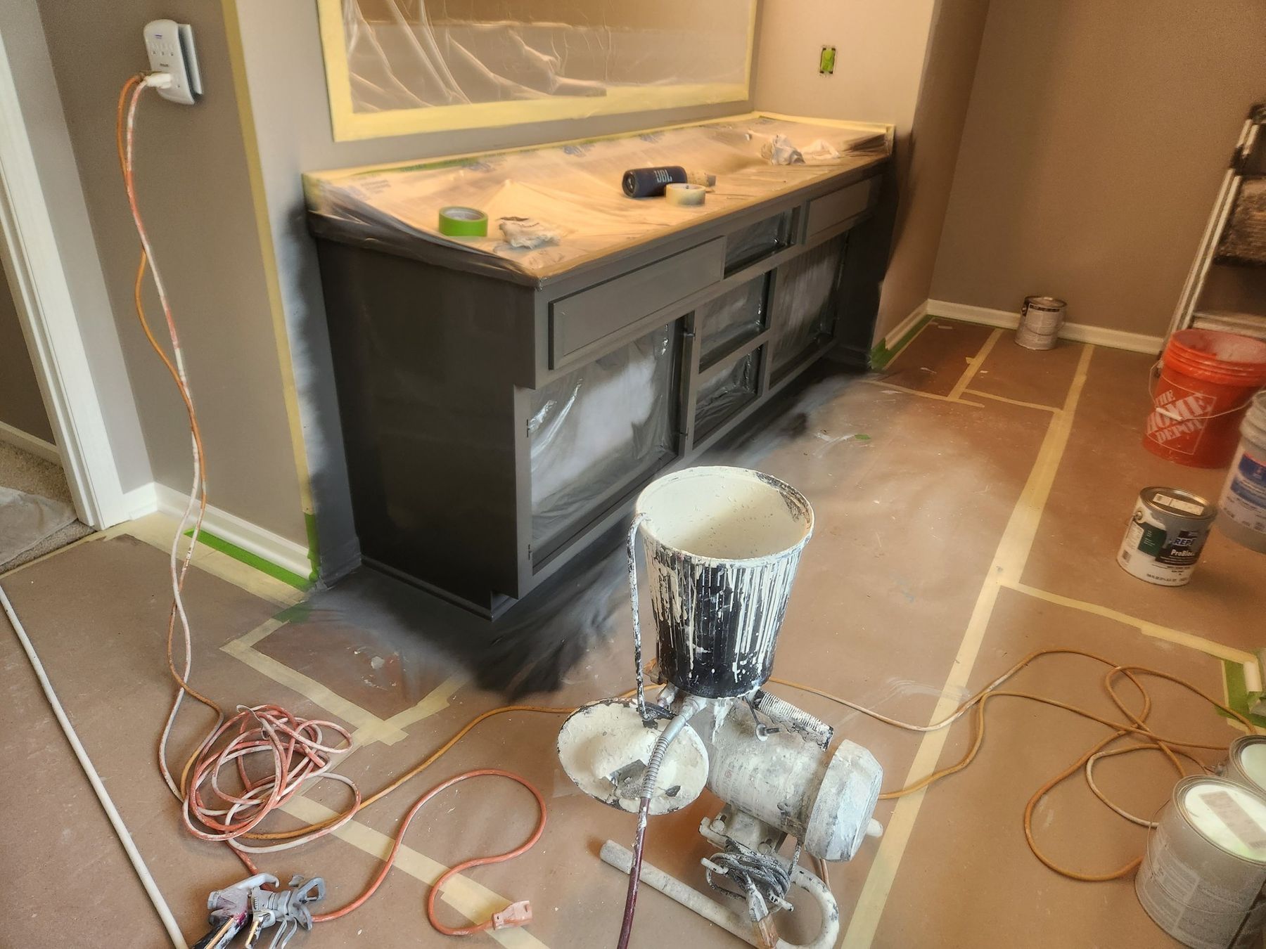 Spray setup in the bathroom, floors and counters covered
