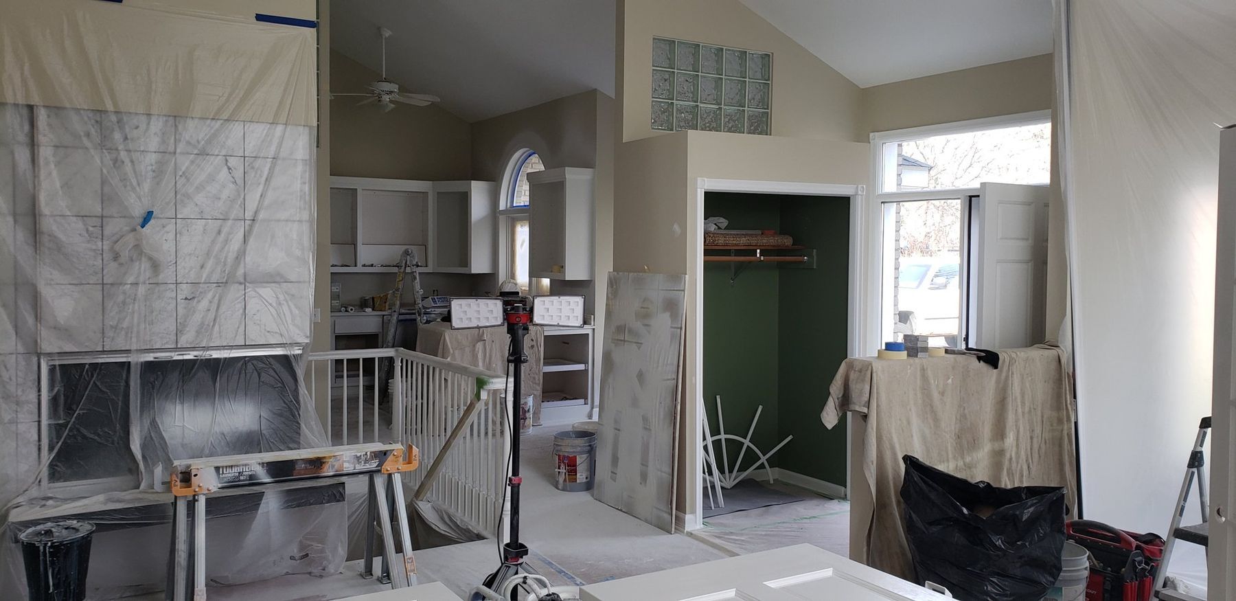 Kitchen masked with plastic for spraying
