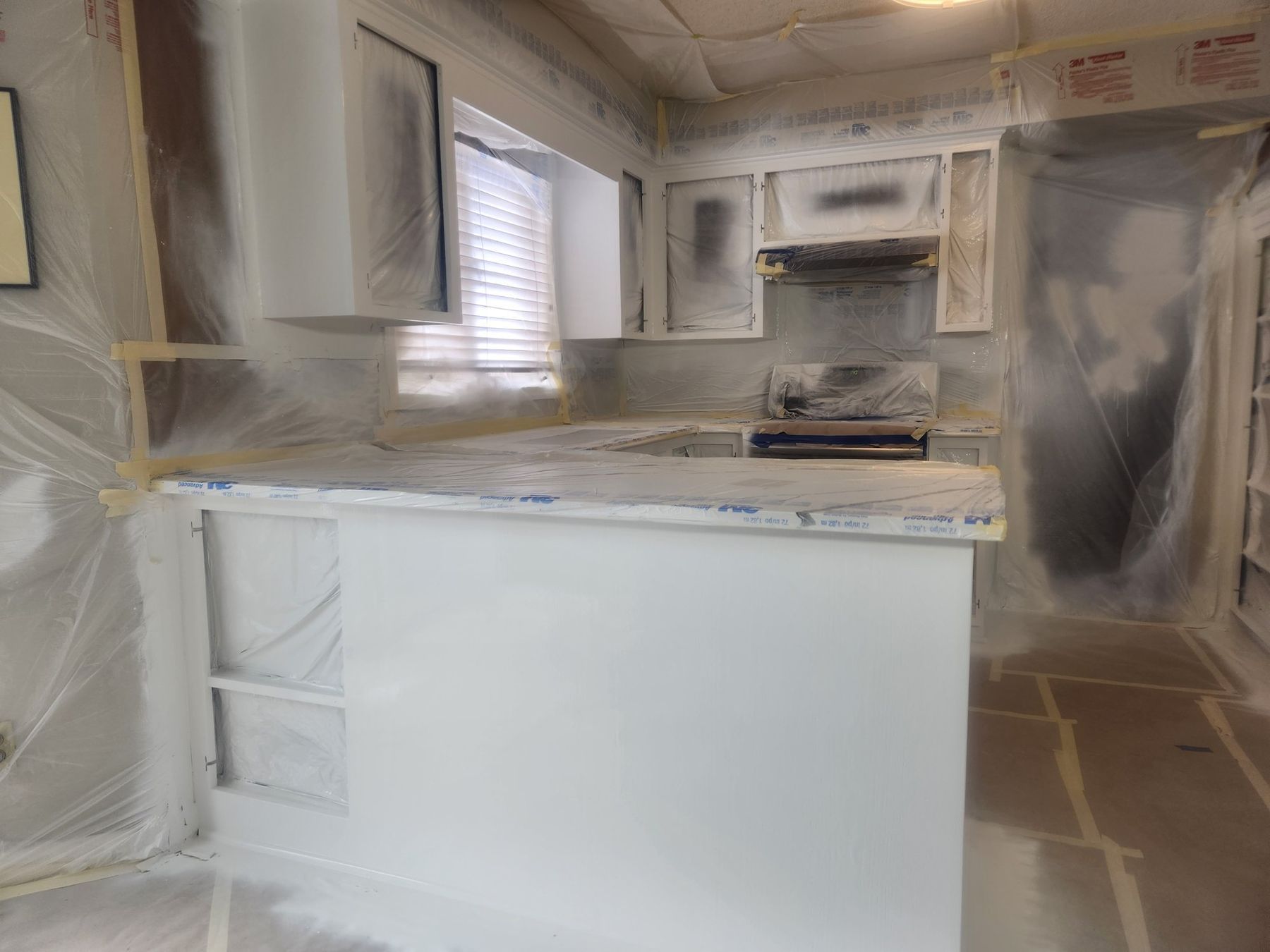 Island primed and sprayed inside containment