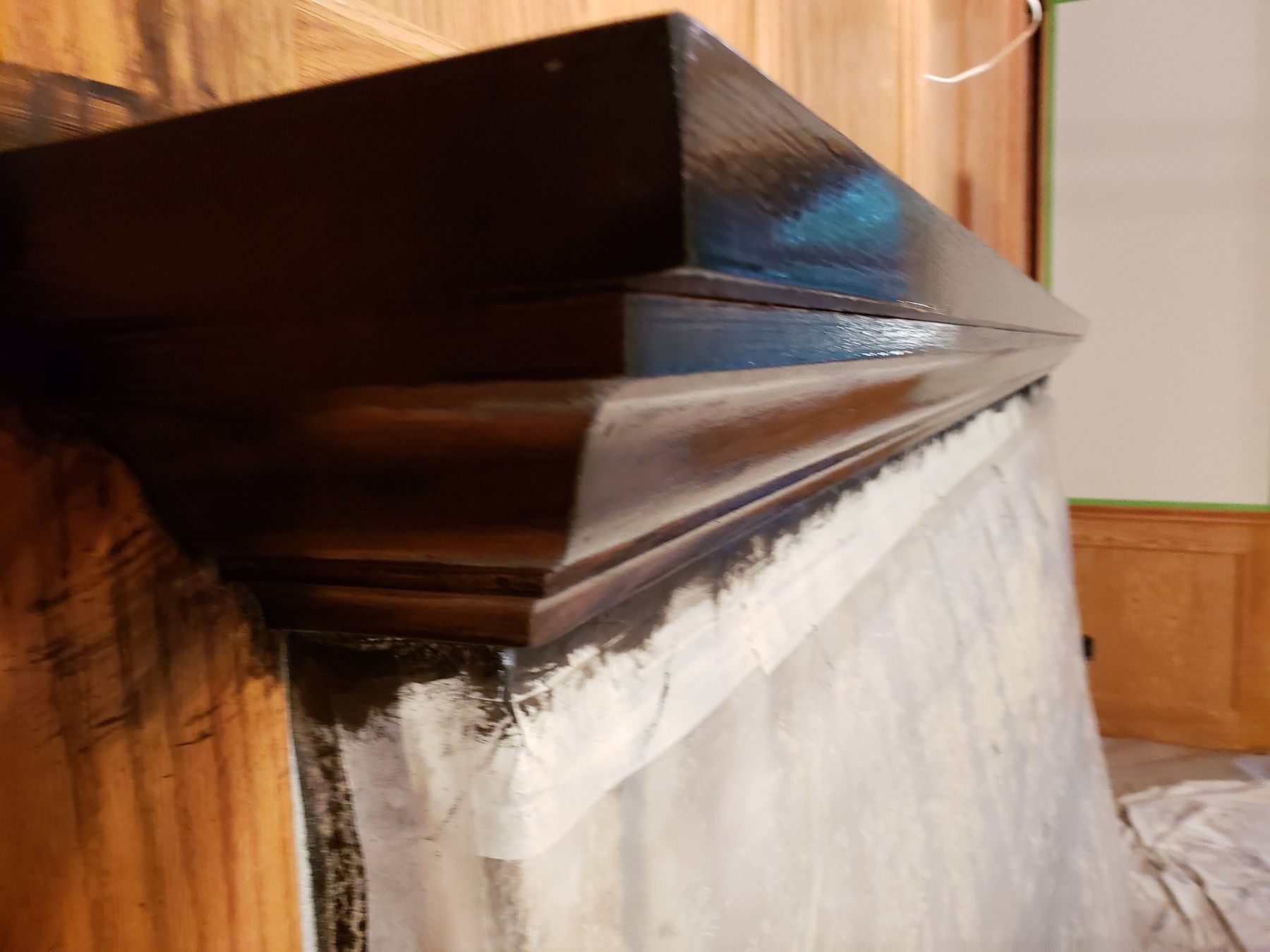 Crown molding being restained espresso
