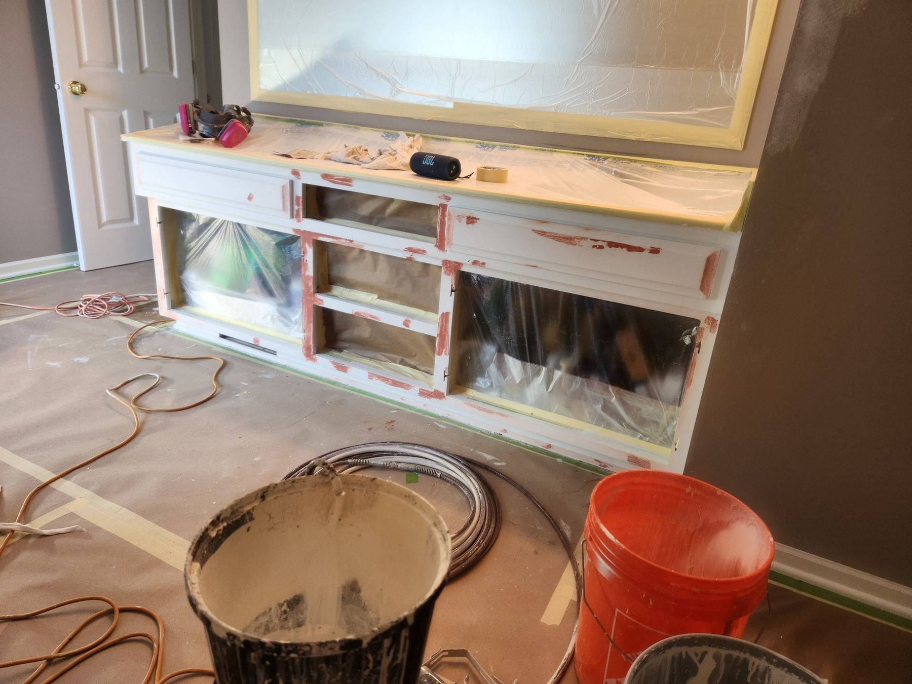 Primed vanity with doors removed